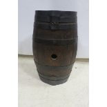 AN OAK AND STEEL BOUND BARREL,