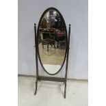 A HEPPLEWHITE DESIGN MAHOGANY CHEVAL MIRROR,