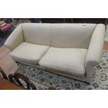 A BEIGE HERRINGBONE UPHOLSTERED SETTEE,