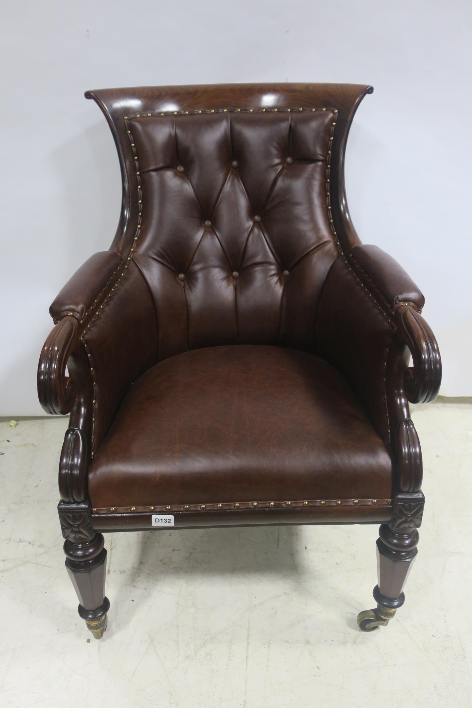 A VERY FINE REGENCY MAHOGANY AND HIDE UPHOLSTERED LIBRARY CHAIR,