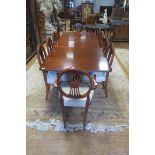 A HEPPLEWHITE DESIGN MAHOGANY ELEVEN PIECE DINING SUITE comprising of ten dining chairs including a