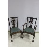 A SET OF 8 CHIPPENDALE DESIGN MAHOGANY DINING CHAIRS including a pair of elbow chairs the shaped