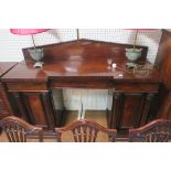 A 19TH CENTURY MAHOGANY SIDEBOARD of inverted breakfront outline with shaped top with moulded back