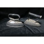 A PAIR OF 19th CENTURY CAST IRON SMOOTHING IRONS