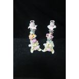 A PAIR OF DRESDEN DESIGN PORCELAIN FLOWER ENCRUSTED CANDLESTICKS,