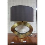 A BLACK LACQUERED AND GILT TABLE LAMP,