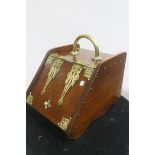 A 19th CENTURY MAHOGANY AND BRASS BOUND SLOPE FRONT FUEL BIN,