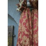 A PAIR OF WINE CURTAINS, with gold fleur de lis decoration lined and interlined 201cm drop,