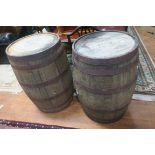 A PAIR OF OAK AND STEEL BOUND WHISKEY BARRELS,