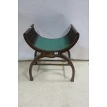 A 19TH CENTURY MAHOGANY INLAID STOOL the shaped upholstered seat with pierced splats raised on a u
