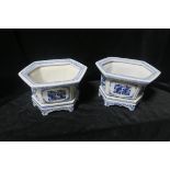 A PAIR OF ORIENTAL BLUE AND WHITE JARDINIERES,