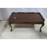 A MAHOGANY COFFEE TABLE,