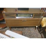 A GRUNDIG RADIOGRAM in teak case