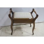 A MAHOGANY MUSIC STOOL,