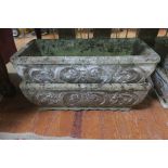 A PAIR OF COMPOSITION STONE TROUGHS,