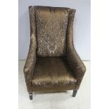 A PAIR OF MAHOGANY AND UPHOLSTERED WING CHAIRS,