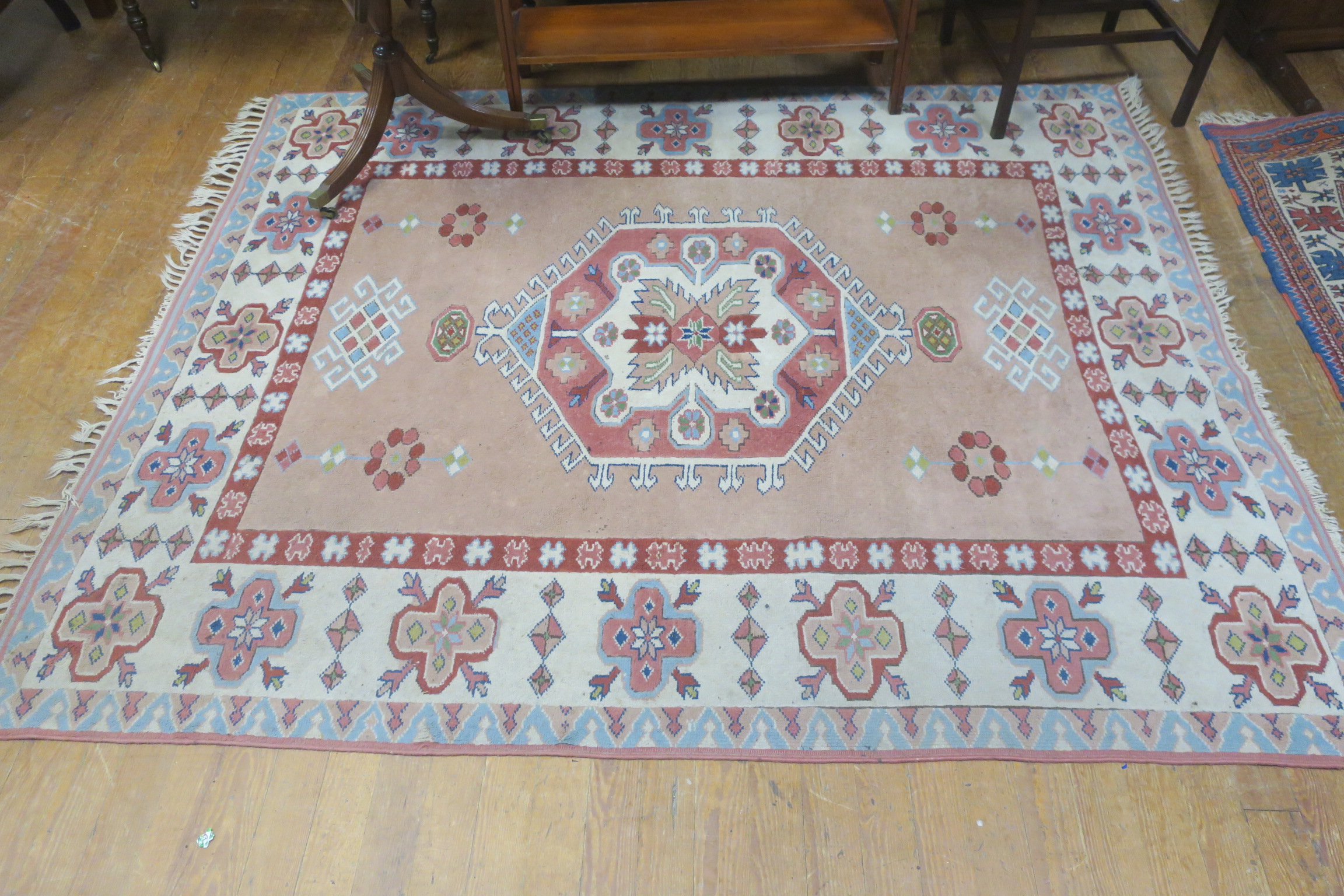 A TURKISH WOOL RUG,