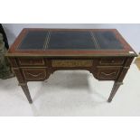 A CONTINENTAL KINGWOOD AND GILT BRASS MOUNTED WRITING DESK rectangular outline with tool leather