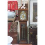 A MAHOGANY CASED GRANDMOTHER CLOCK,