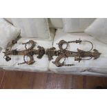 A PAIR OF CONTINENTAL CARVED WOOD TWO BRANCH WALL LIGHTS each with scroll back plate with bird