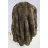 A LADIES MINK 3/4 LENGTH COAT