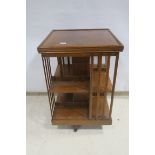 A 19th CENTURY OAK REVOLVING BOOKCASE,