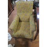 A 19th CENTURY MAHOGANY AND UPHOLSTERED ARMCHAIR,