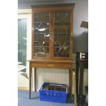 A 19TH CENTURY SHERATON DESIGN MAHOGANY INLAID DISPLAY CABINET on a stand the moulded corners above