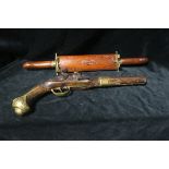 A BRASS BOUND FLINTLOCK GUN,