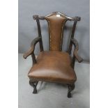 A FINE 19th CENTURY MAHOGANY AND UPHOLSTERED HIDE LIBRARY CHAIR, IRISH,