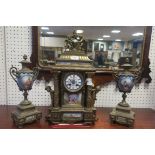 A 19th CENTURY GILT METAL AND PORCELAIN CLOCK GARNITURE,