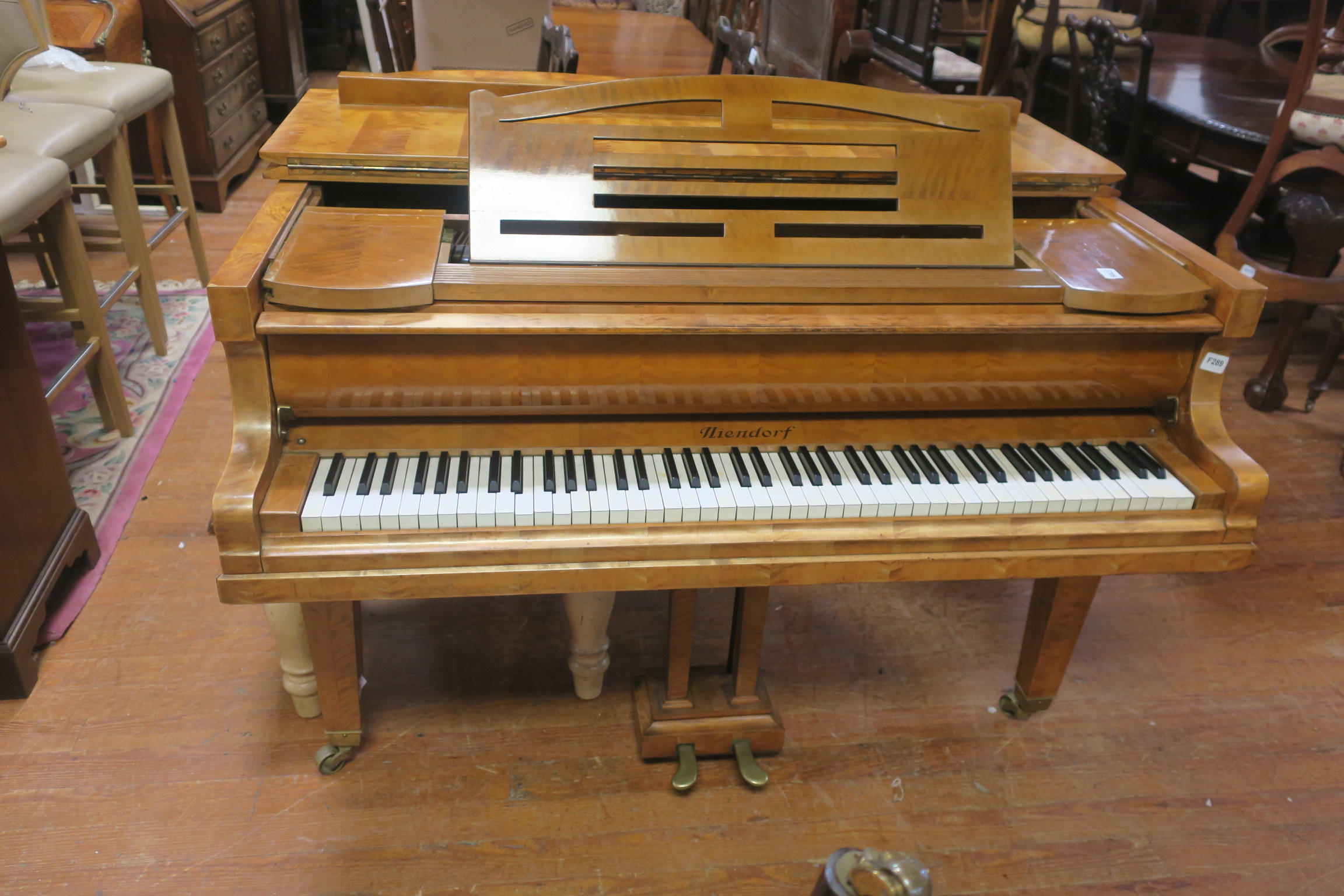 A VERY FINE NIENDORF SATINWOOD CASED BABY GRAND PIANO,