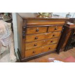 A 19th CENTURY MAHOGANY CHEST, of rectangular outline the shaped top above one long,