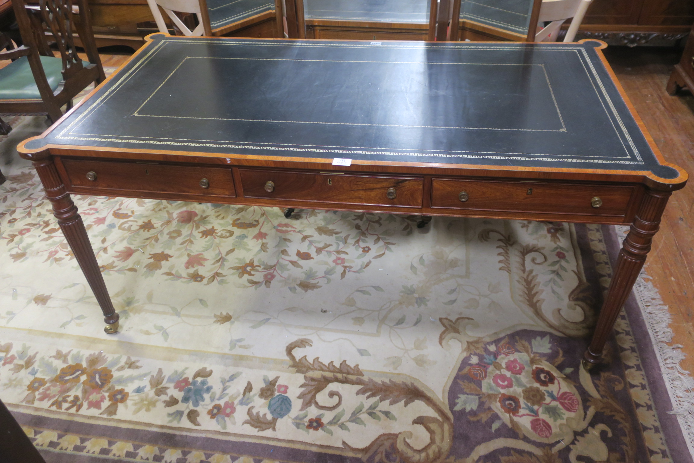 A FINE MAHOGANY AND KINGWOOD PARTNER'S LIBRARY TABLE,