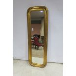 A CONTINENTAL GILT FRAME MIRROR,