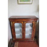 A FINE 19TH CENTURY KINGWOOD AND MAHOGANY DISPLAY CABINET of rectangular outline with shaped top