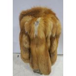 A LADIES FOX FUR 3/4 LENGTH COAT