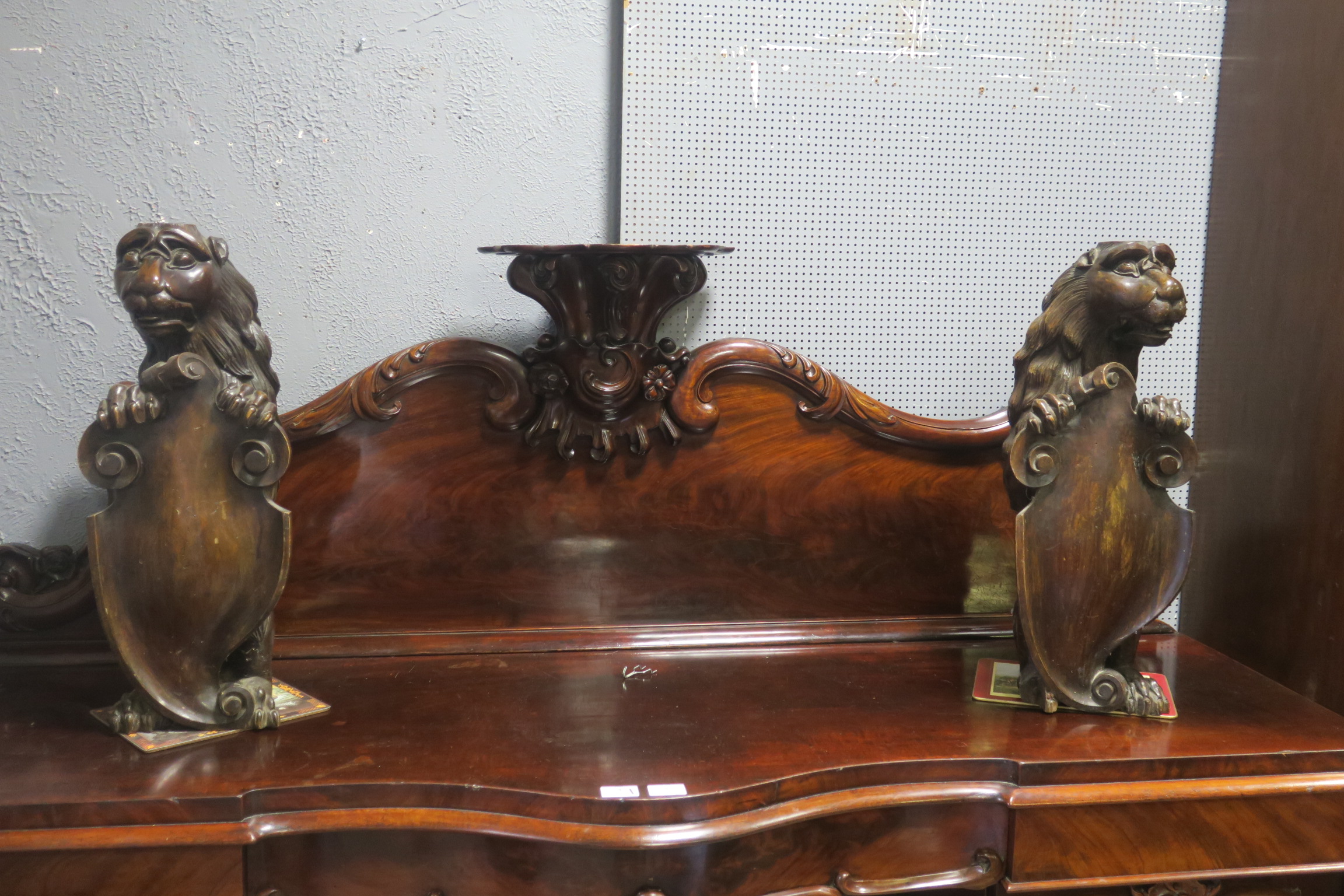 A FINE PAIR OF 19TH CENTURY CARVED WOOD LIONS each fully maned beast shown standing on hind legs