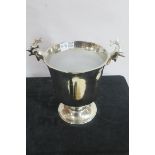 A SILVER PLATED ICE BUCKET of circular tapering form raised on spreading foot 28cm (h) x 34cm (d)