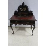 A 19TH CENTURY MAHOGANY WRITING TABLE the super structure with bevelled glass mirror above 2 short