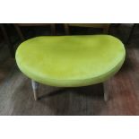 A RETRO STOOL the oval upholstered seat raised on cylindrical tapering legs
