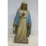 A PLASTER AND POLYCHROME FIGURE modelled as the Blessed Virgin 83cm (h) x 40cm (w) x 24cm (d)