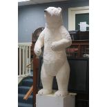 A LARGE STUFFED FIGURE modelled as a polar bear shown standing 150cm (h)