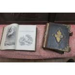 TWO LEATHER BOUND VOLUMES, one with illustrations, references and maps,