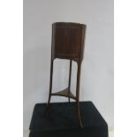 A 19TH CENTURY MAHOGANY AND SATINWOOD INLAID JARDINIERE STAND of circular outline with brass liner