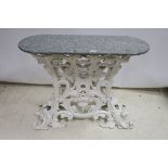 A VICTORIAN DESIGN CAST IRON MARBLE TOP TABLE,