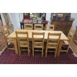 A GOOD NINE PIECE OAK BREAKFAST SUITE,