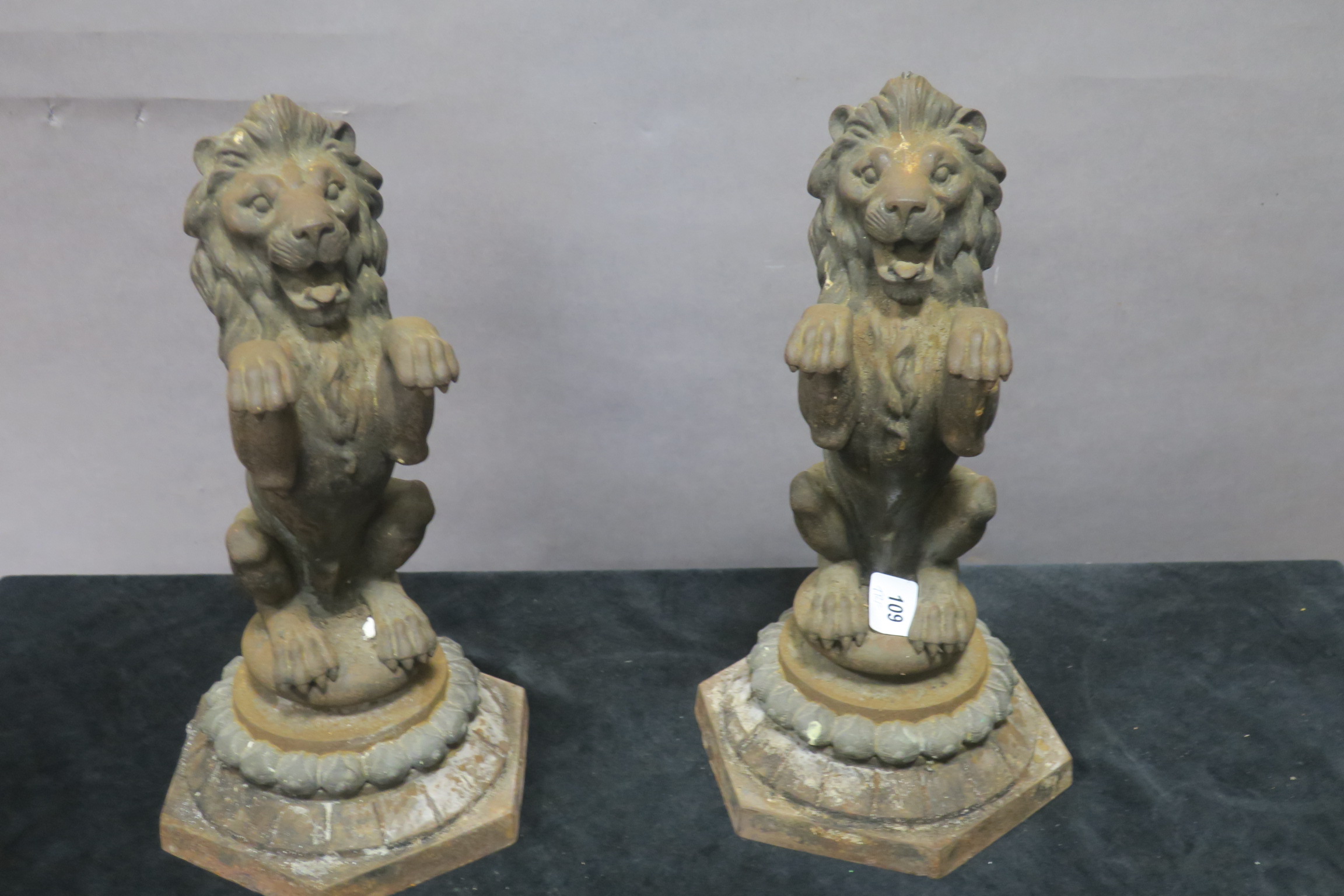 A PAIR OF 19th CENTURY CAST IRON FIGURES,