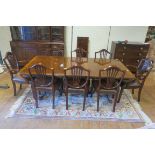 A NINE PIECE MAHOGANY DINING ROOM SUITE, comprising eight Hepplewhite design dining chairs,