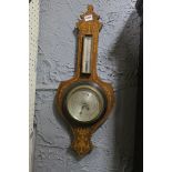 A 19TH CENTURY ROSEWOOD INLAID BANJO BAROMETER with silvered dials